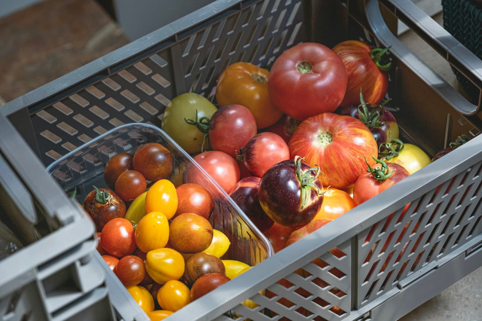 A crate of ripe heirloom tomatoes
